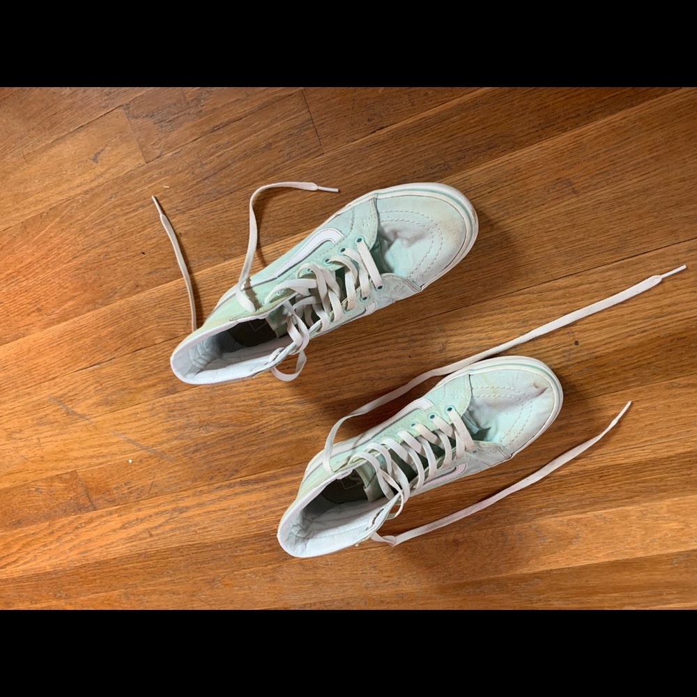 minty white colored high top vans